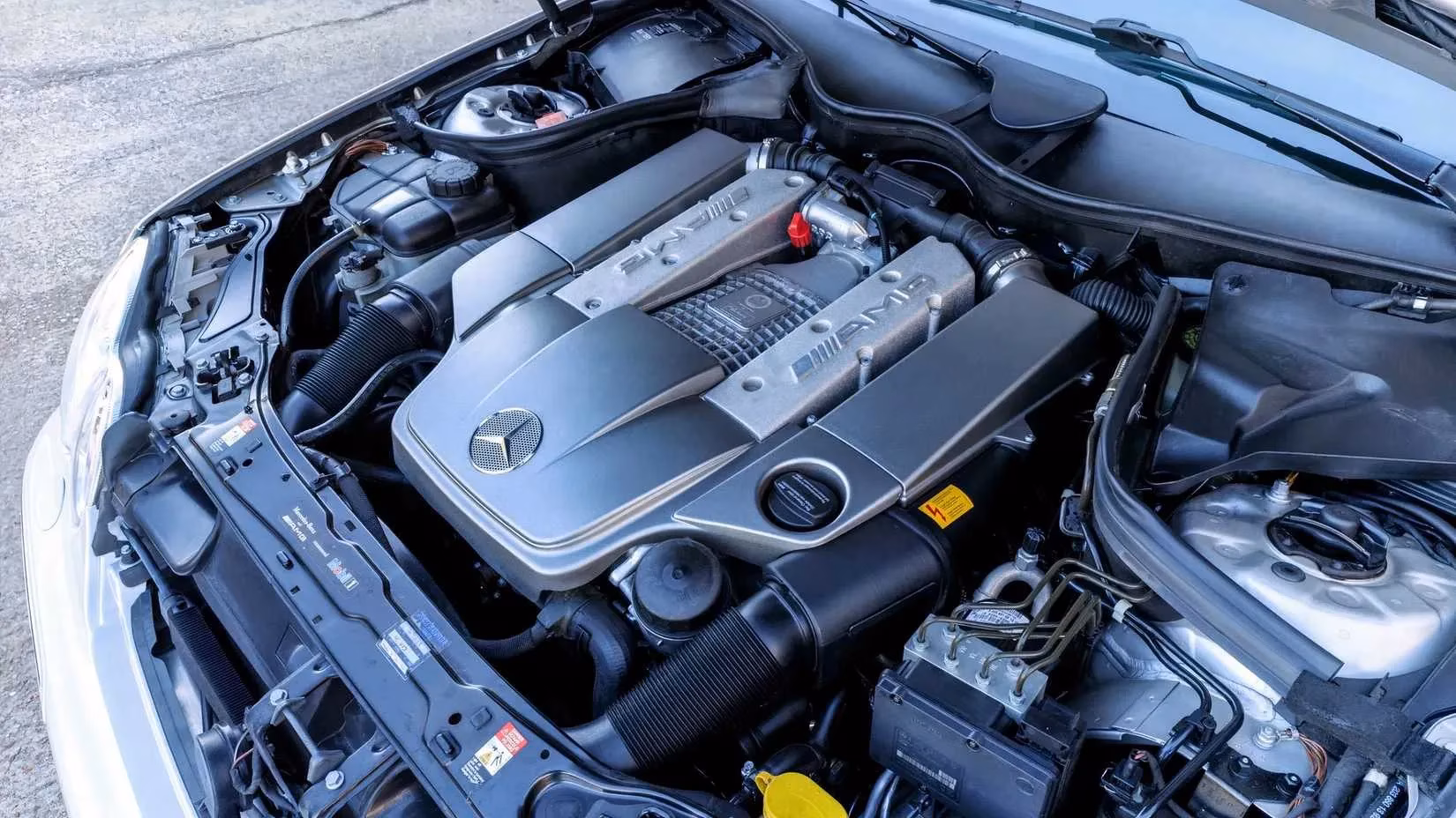 the-ultimate-performance-bargain-uncovering-the-2003-mercedes-benz-c32-amg-sleeper-sedan-image-1