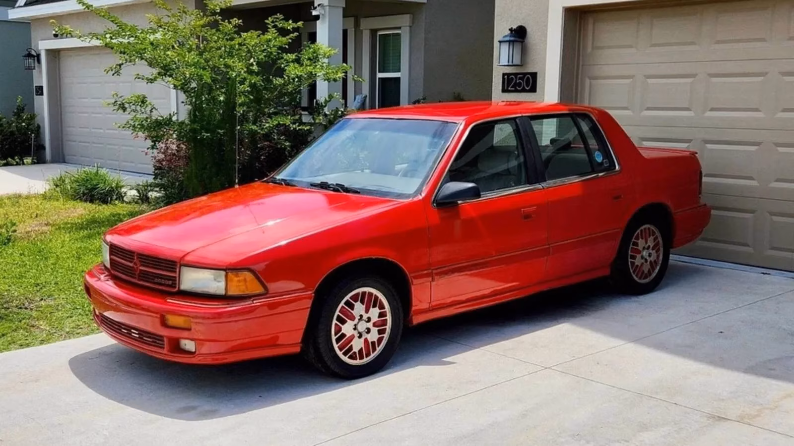 1991-dodge-spirit-r-t-a-5950-turbo-unicorn-with-a-blown-heart-image-0