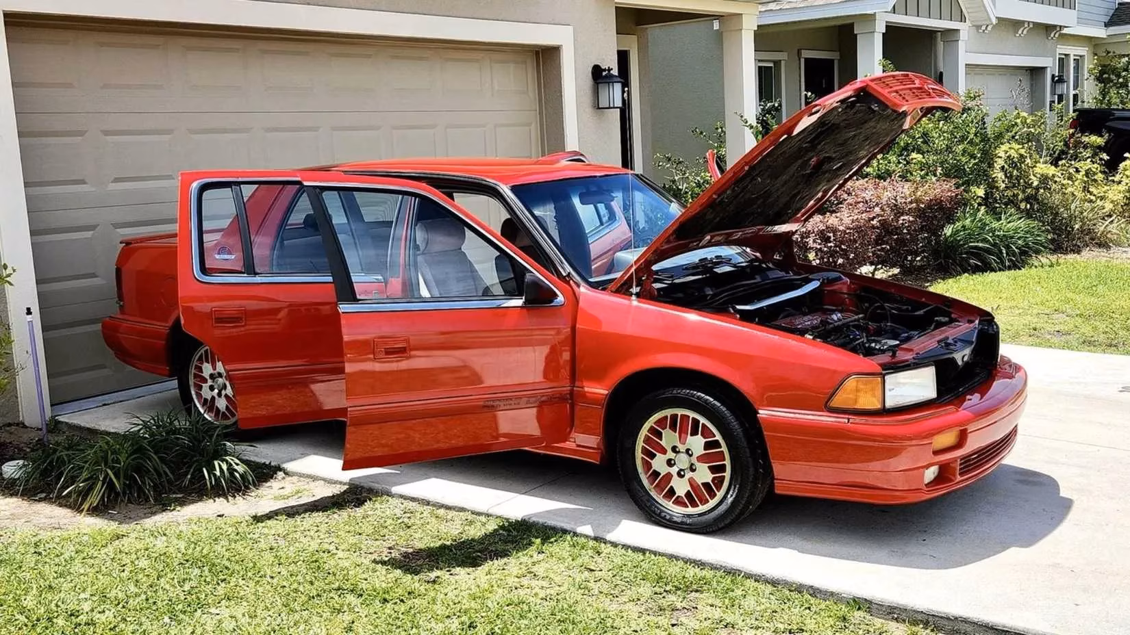 1991-dodge-spirit-r-t-a-5950-turbo-unicorn-with-a-blown-heart-image-1